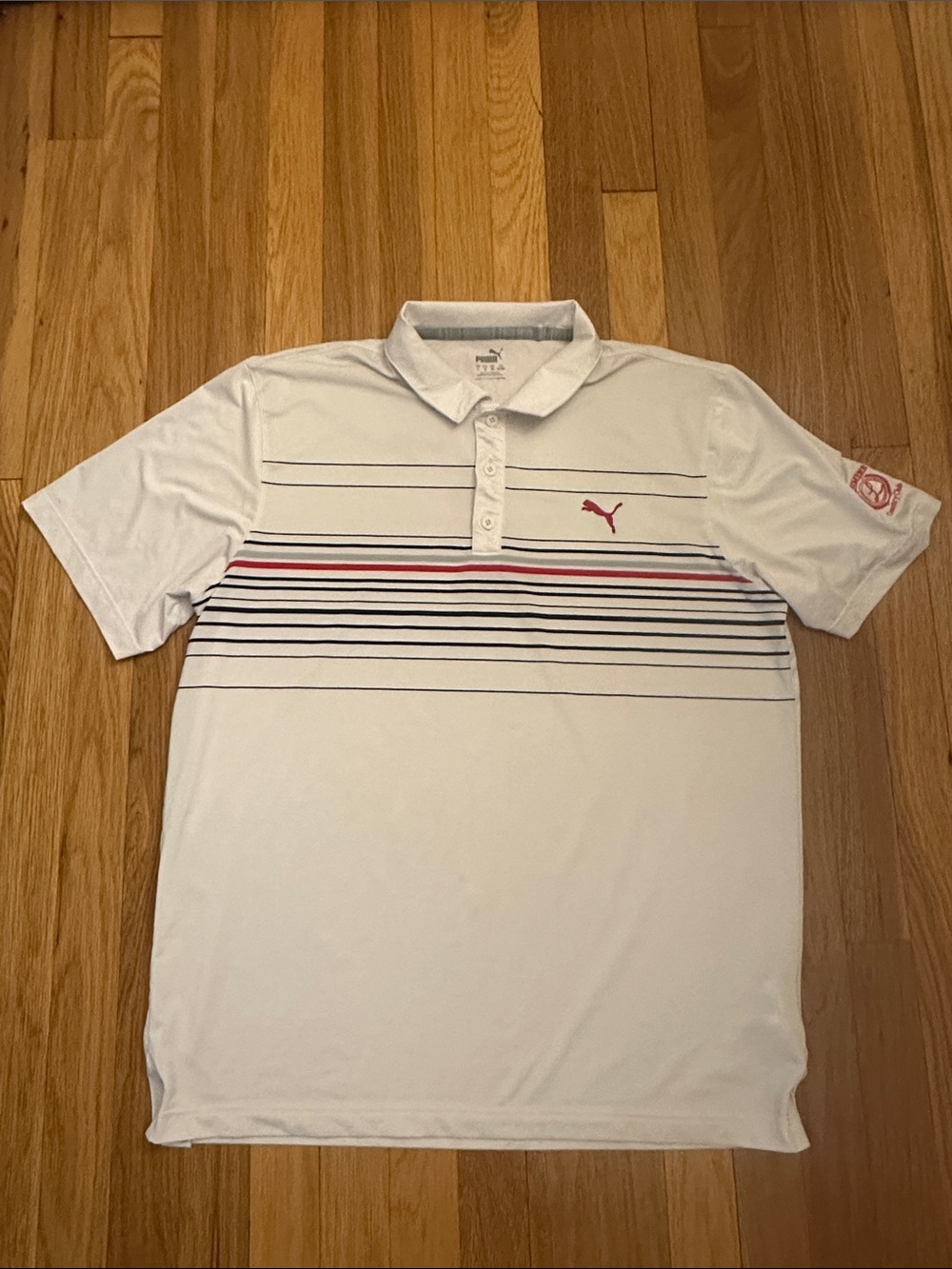 Puma White Polo with Navy and Red Stripe Accents